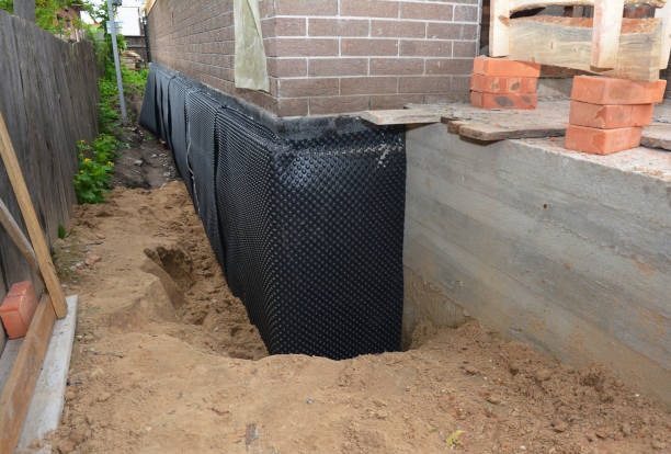 Happy homeowners after waterproofing job in Andrews Air Force Base
